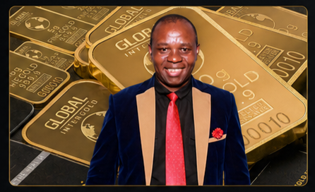 Evariste Umba, Host & CEO of UMBA, standing before gold bullion